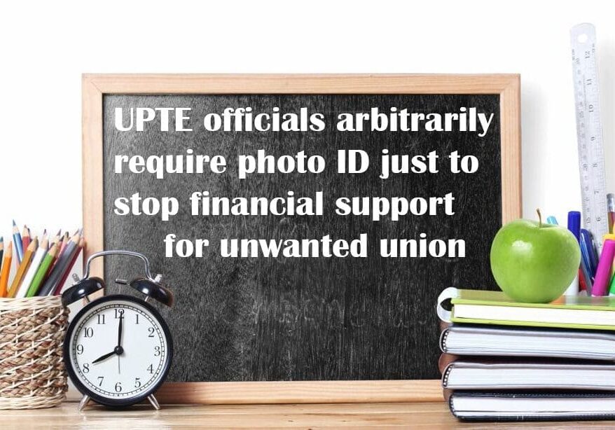 UPTE officials arbitrarily board with a clock and some books