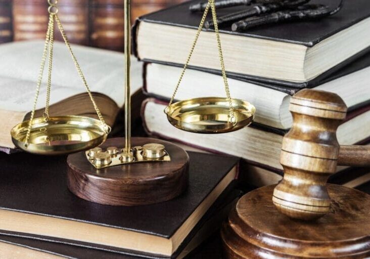 A golden color scale along with a hammer board