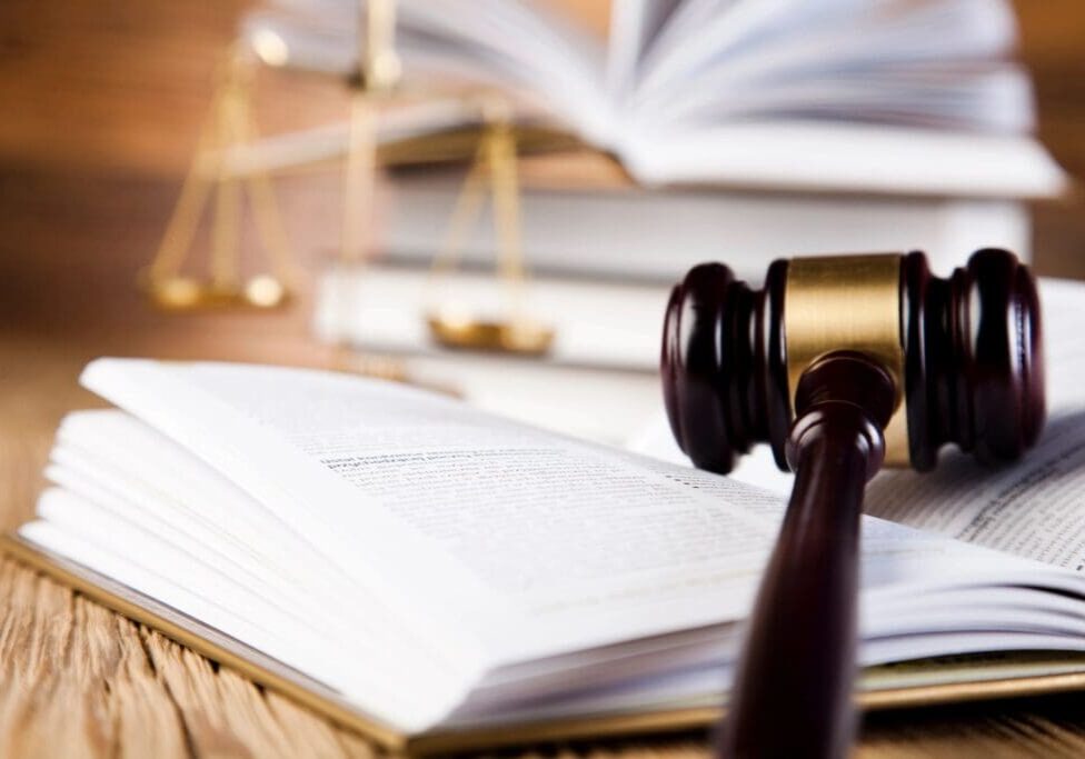 A hammer kept on an open book