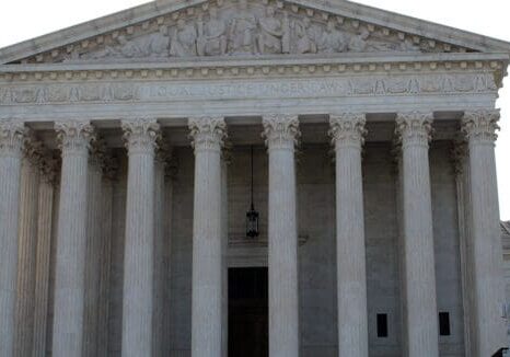 Outside view of a white color mansion